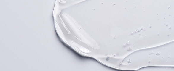 The texture of a cosmetic serum for the face with hyaluronic acid and collagen. Copy space