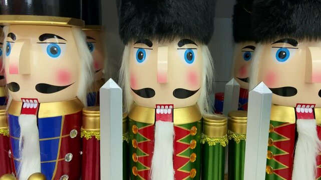 shot of nutcracker christmas soldier statues in row on display
