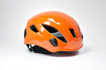 stock photo of climbing helmet on white background clean and minimal with ample copy space on left side perfect for