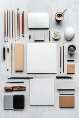clean arrangement of digital and traditional work tools displayed neatly on smooth matte surface