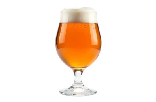 Bright golden beer served in a tulip glass with frothy top in a minimalist setting