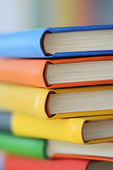 Vibrant Hardcover Book Stack Showcasing Colorful Covers