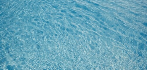 Obraz premium a tranquil, minimalistic composition of clear blue water with gentle ripples