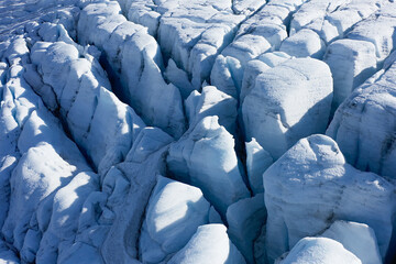 Breathtaking Glacial Ice Formations Featuring Deep Crevasses in Beautiful Blue Shades