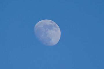Moon over blue sky