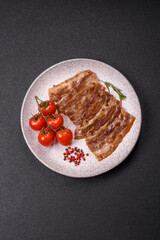 Crispy fried pork bacon sliced with salt, spices and herbs