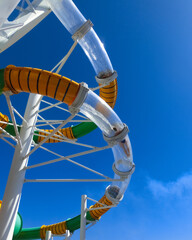 The water park slides and sky at abstract cruise ship