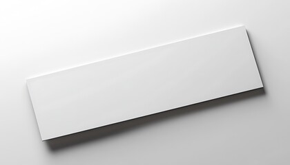 Horizontal white banner mockup laying flat with minimal shadow on white