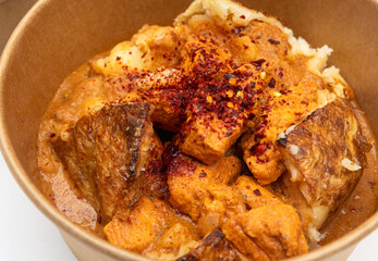 Oven-baked jacket potato recipes with cheese, chicken, tuna mayo, baked beans, red chillies, close up with white background. 