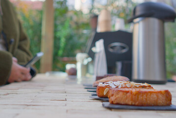Selection of Gourmet Pastries on Display at Outdoor Caf&eacute;