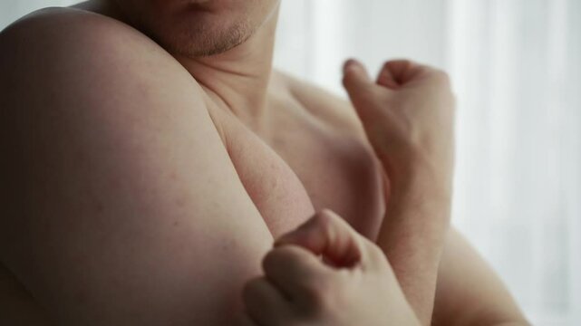 Male biceps on the arm.
Pumped up muscles of a man.
An athletic man shows off his muscles.
Strong guy with pumped up arms