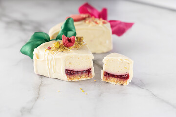 Delicious and Beautifully Layered Dessert Featuring a Delightful Red Fruit Filling