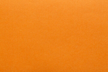 Orange paper sheet fabric texture. Orange canvas cardboard texture as a background. Orange...