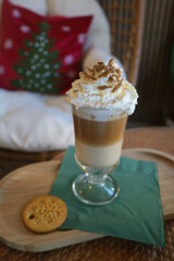 cappuccino with cream in a cafe, New Year's mood.