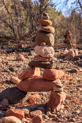 A stack of rocks is arranged in a pyramid shape
