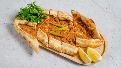 Turkish meat pide on tray isolated