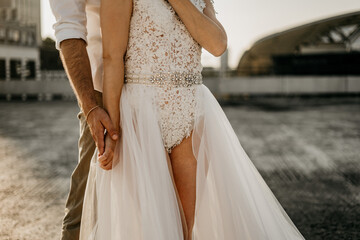 Bridal couple during a photoshoot on a rooftop