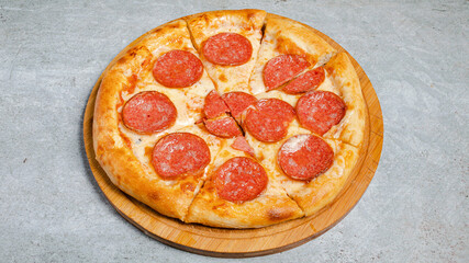 Pizza pepperoni on tray isolated