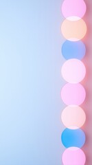 Vertical arrangement of translucent pastel-colored circles in pink, blue, and peach tones on a soft gradient background.

