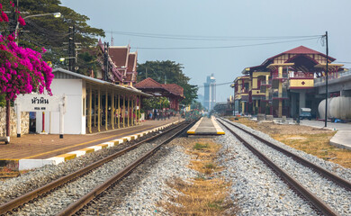 Platform sign and railway tracks,passing through Hua Hin railway station,Thailand.