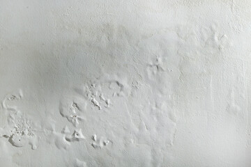 Saltpeter or mold on the wall, Closeup of wall stained with water infiltration. Potassium nitrate,...