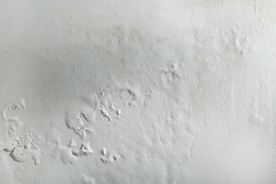 Saltpeter or mold on the wall, Closeup of wall stained with water infiltration. Potassium nitrate, which is present in the building materials comes into contact with oxygen and creates excess moisture
