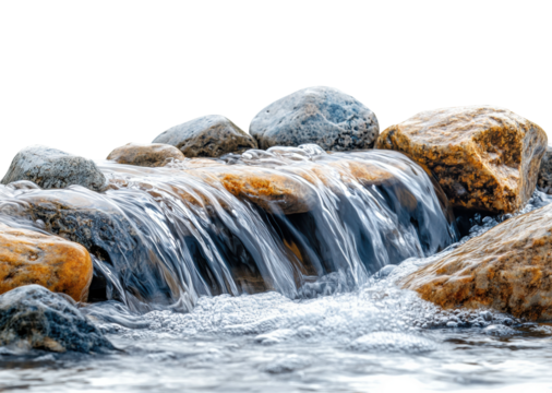 Small waterfall flowing over smooth rocks with clear water, natural stream and serene landscape for nature-inspired concepts isolated on transparent background