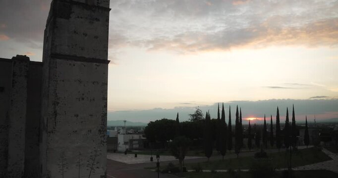 Sunset in Tecamachalco, Puebla with the tower of former franciscan convent