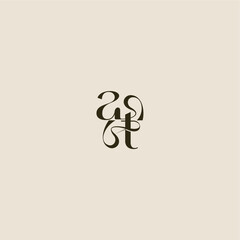 dynamic line monogram logo luxurious concept AT elegant wedding letter