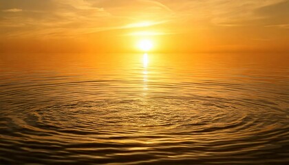 Fototapeta premium Golden Hour Tranquility: A mesmerizing sunset paints the sky with warm hues, casting a golden glow on the rippling water. The tranquil scene evokes a sense of peace and serenity. 