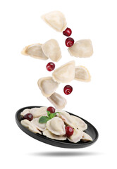 Dumplings (varenyky) with cherries and plate in air white background