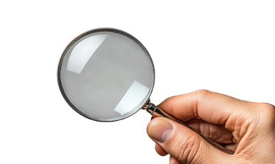 Magnifying glass held by hand with reflective surface, search and inspection tool for detective, research, or focus concepts isolated on transparent background