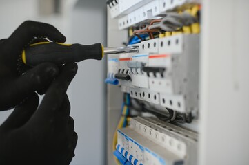 Close-up of electrician working on circuitry