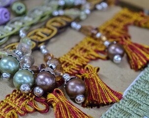 beautiful ruffles ribbons and beads for sewing and needlework. High quality photo