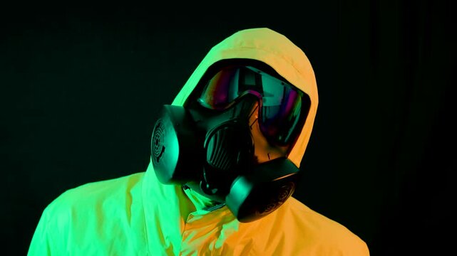 Cyberpunk raver in gas mask tilting head slowly with neon orange and cyan lighting