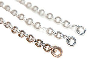 Two Different Chains Next to Each Other with Some Space Between PNG