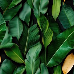 Fototapeta premium Seamless pattern of vibrant green banana leaves