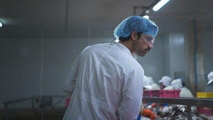 Production control supervisor inspects and controls the operation of each step in the production...