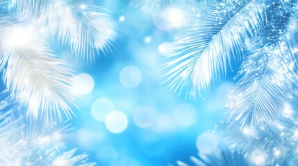 Sparkling white palm fronds on a bright blue bokeh background.
