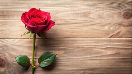 A close-up of a single long-stemmed red rose with soft pink petals, set against a warm wooden background with subtle grain texture , natural background, refined