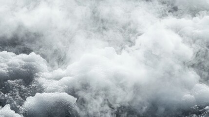 Fototapeta premium A dense layer of white clouds or steam, creating a misty, ethereal atmosphere.