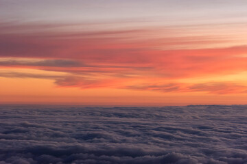 Serene Sunset Above the Clouds