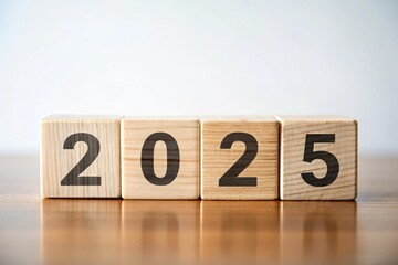 Minimalist wooden cubes aligned to represent the year 2025, showcasing simplicity and modern design