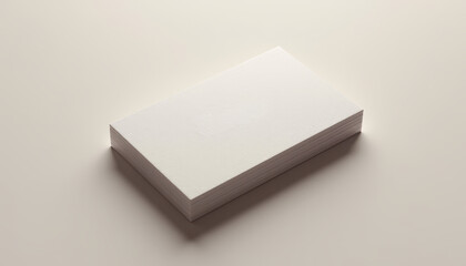 Fototapeta premium Embossed business card mockup with soft shadows on light background, copy space