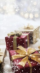 Festive gifts wrapped with golden bows and snow