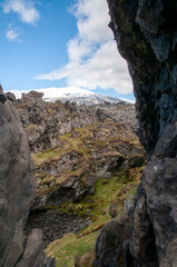 Djupalonssandur Beach Iceland, basalt rock formation with lava tunnel 