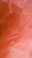 Fantasy steam. Splash cloud. Defocused bright peach orange color paint ink smoke flowing mist...