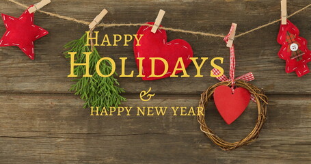 Image of christmas and new year greetings text over christmas decoration © vectorfusionart