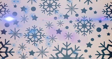 Image of glowing light over christmas snowflakes falling