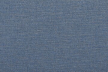 Fototapeta premium a close up of a blue fabric with a small white stripe